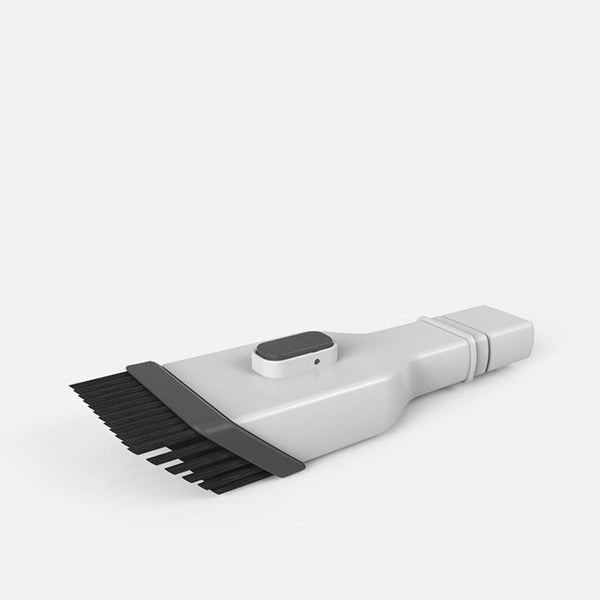 Vacuum cleaner-angled brush-sweeps up-dust-and-debris-on-uneven surfaces-white